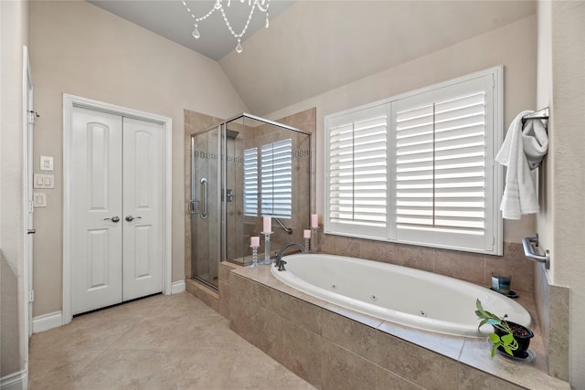 full bathroom with tile patterned floors, vaulted ceiling, a shower stall, and a whirlpool tub