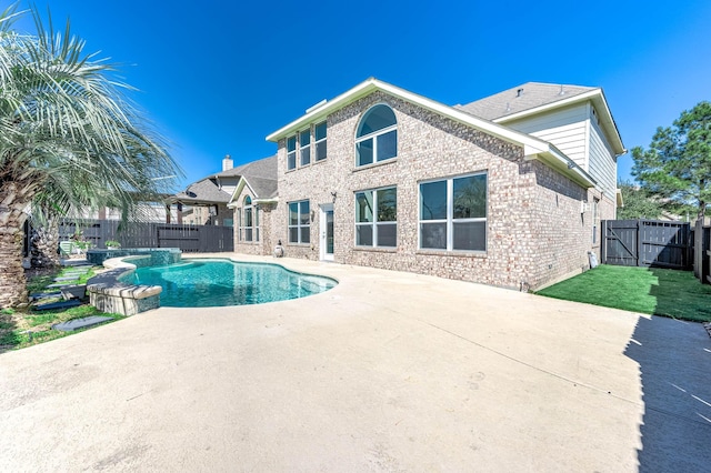 view of swimming pool featuring a gate, a fenced in pool, a fenced backyard, and a patio area