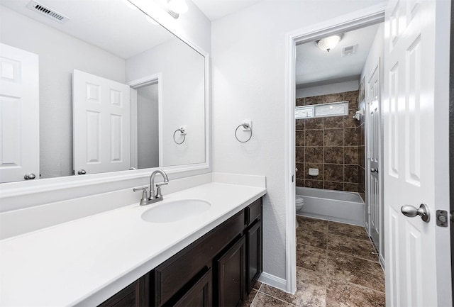 full bath featuring vanity, shower / tub combination, toilet, and visible vents