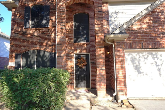 view of front of property featuring brick siding