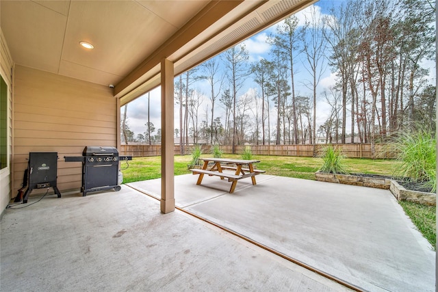 view of patio / terrace featuring area for grilling and a fenced backyard