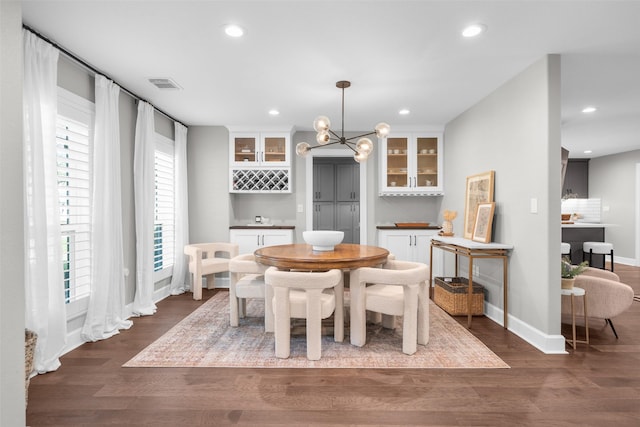 dining room with visible vents, recessed lighting, baseboards, and dark wood-style flooring