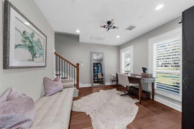 office space featuring dark wood finished floors, recessed lighting, visible vents, and baseboards