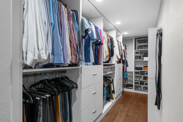 spacious closet with wood finished floors