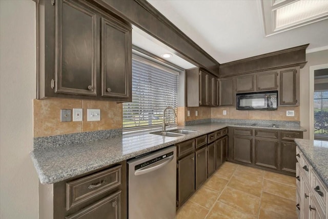 kitchen with a sink, tasteful backsplash, stainless steel dishwasher, dark brown cabinetry, and black microwave