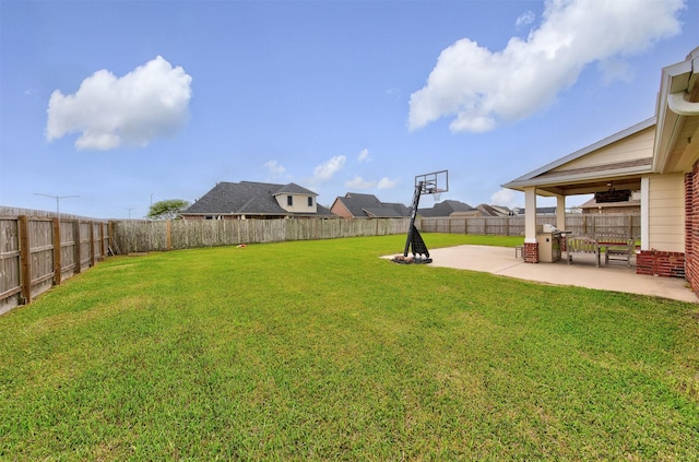 view of yard featuring a fenced backyard and a patio area