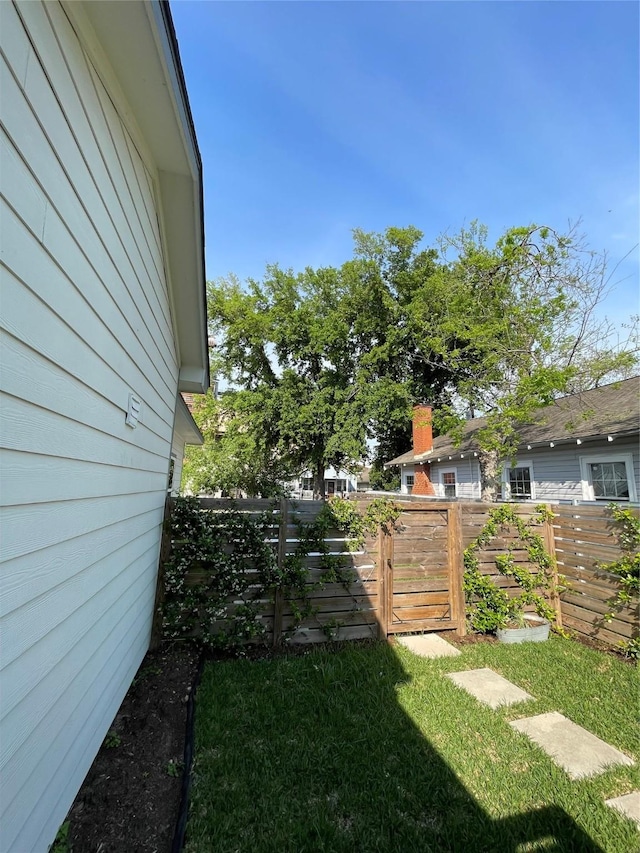 view of yard with fence