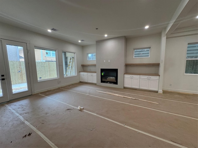 4403 Feagan, Houston, TX 77007 - unfurnished living room featuring a glass covered fireplace, recessed lighting, and baseboards