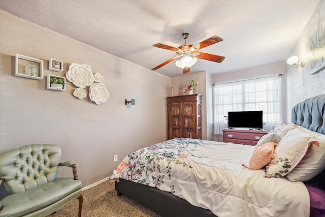 bedroom featuring carpet, baseboards, ceiling fan, a textured ceiling, and a textured wall