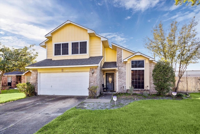 view of front of property featuring driveway, a shingled roof, fence, a front yard, and an attached garage