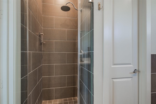 bathroom featuring a shower stall