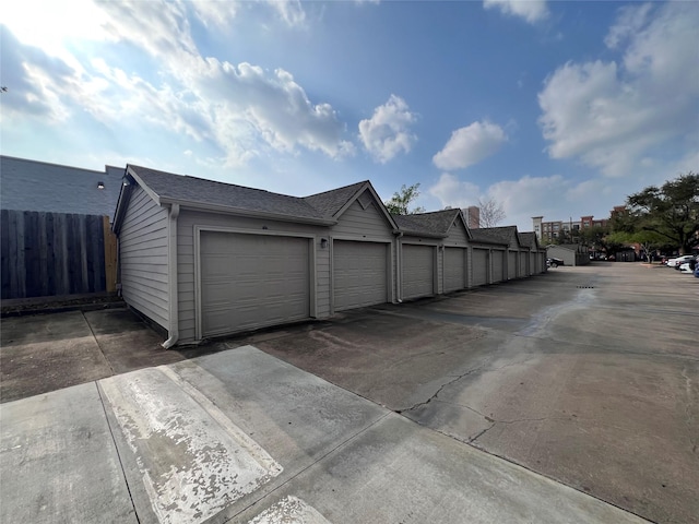 garage with fence