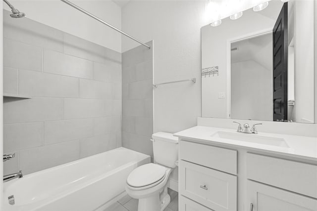 bathroom featuring toilet, shower / washtub combination, and vanity