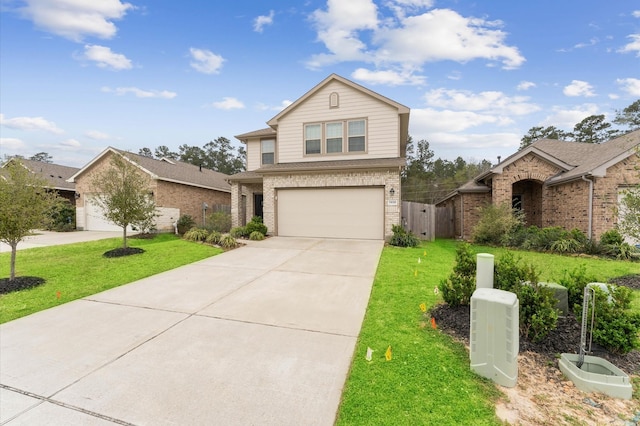 traditional home with brick siding, a garage, concrete driveway, and a front lawn