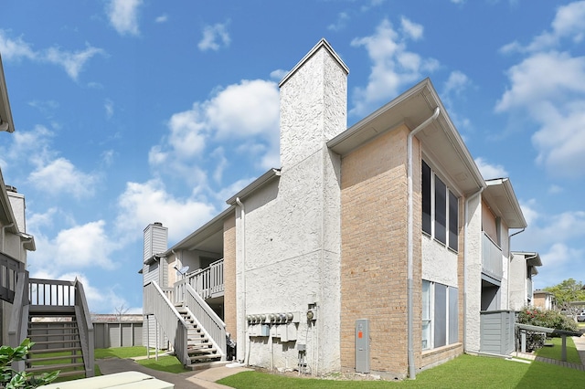 view of building exterior featuring stairway