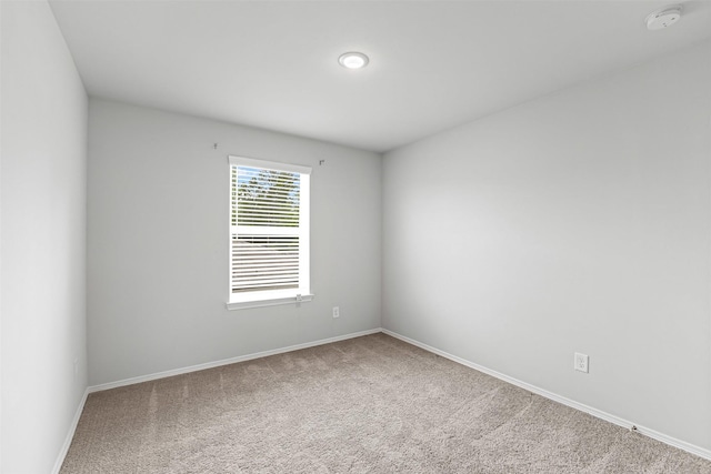 10718 Soapberry Ct, Tomball, TX 77375 - carpeted empty room with baseboards