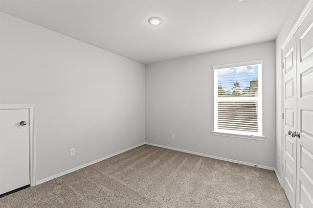 10718 Soapberry Ct, Tomball, TX 77375 - unfurnished bedroom featuring baseboards and carpet