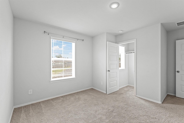 10718 Soapberry Ct, Tomball, TX 77375 - unfurnished bedroom with baseboards and carpet