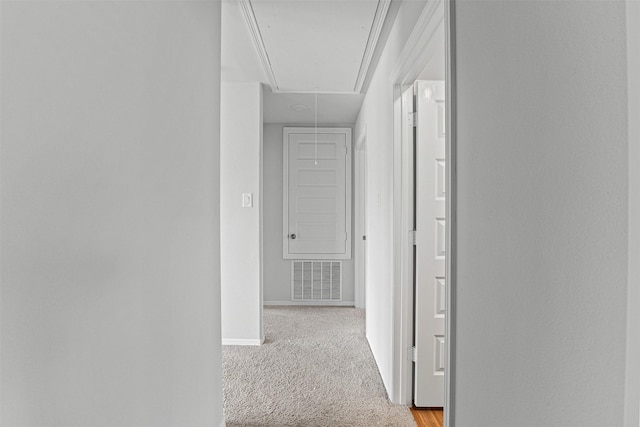10718 Soapberry Ct, Tomball, TX 77375 - hallway featuring visible vents, attic access, baseboards, and light carpet