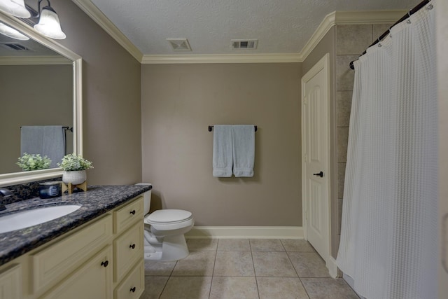 bathroom with crown molding and visible vents