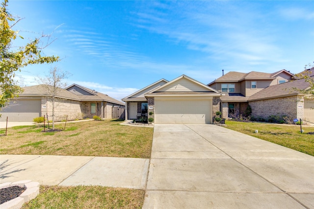 view of front facade featuring fence, a front lawn, concrete driveway, a garage, and brick siding