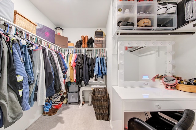 spacious closet with carpet floors