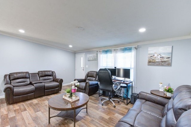 living room featuring recessed lighting, baseboards, ornamental molding, and light wood finished floors