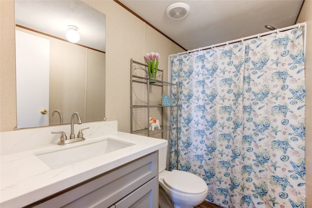 full bathroom with visible vents, toilet, a shower with curtain, ornamental molding, and vanity