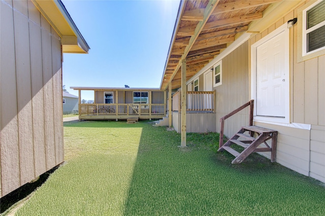 view of yard with a deck