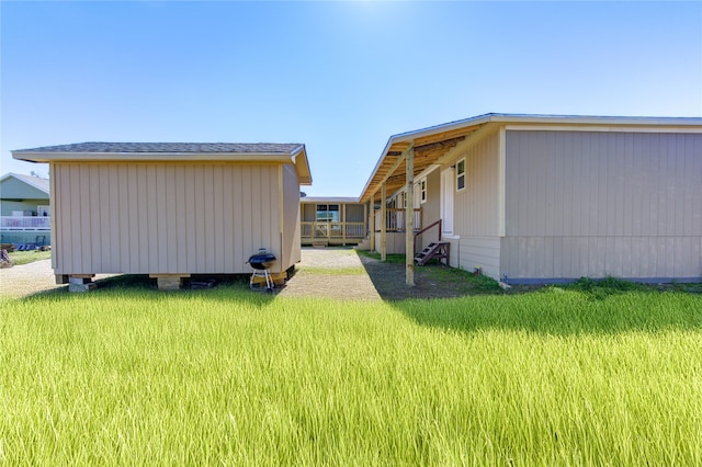 view of property exterior featuring a yard