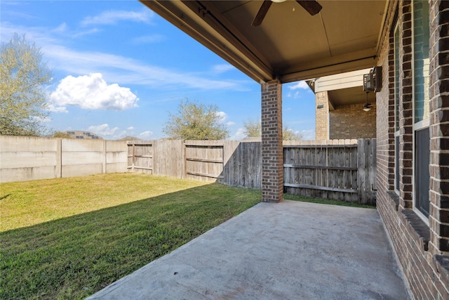 exterior space with a fenced backyard, a ceiling fan, and a patio