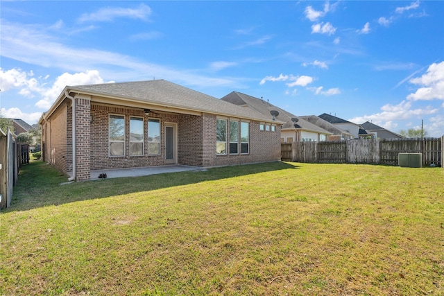 8022 Duncan Ranch Ln, Richmond, TX 77407 - back of house featuring brick siding, a ceiling fan, and a patio area