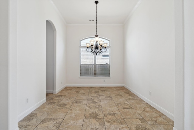 spare room featuring baseboards, arched walkways, a notable chandelier, and crown molding