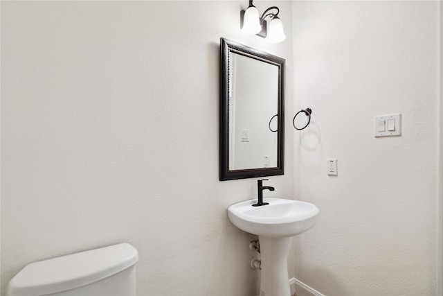 8022 Duncan Ranch Ln, Richmond, TX 77407 - bathroom featuring toilet