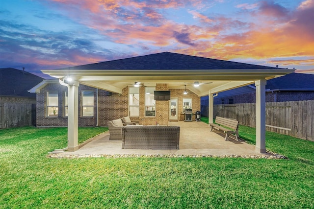 view of patio / terrace with an outdoor living space and a fenced backyard