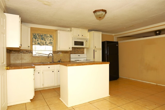 kitchen featuring backsplash, ornamental molding, white cabinets, white appliances, and a sink