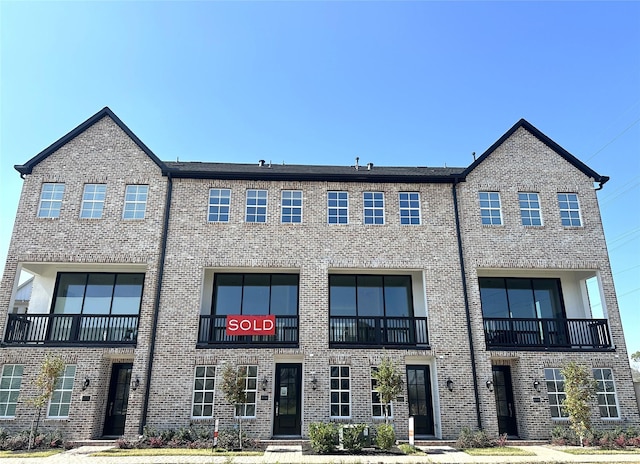 multi unit property with brick siding