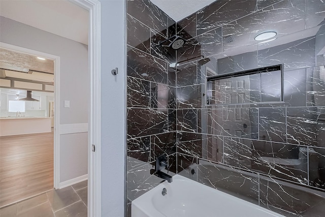 full bathroom with bathtub / shower combination and a sink