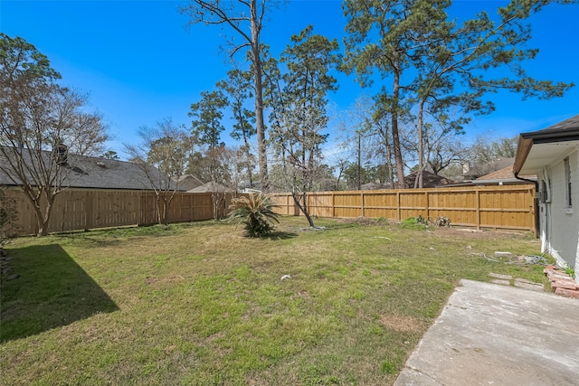 view of yard featuring a fenced backyard