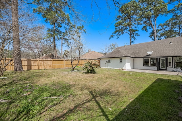 view of yard with a patio area and fence