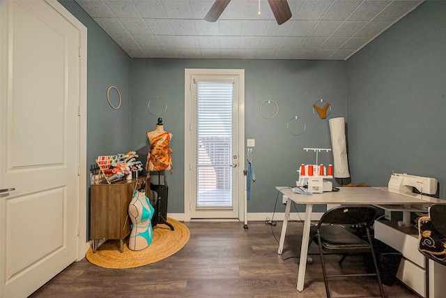 home office with baseboards, a ceiling fan, and wood finished floors