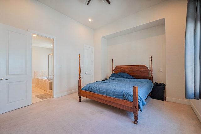 carpeted bedroom featuring recessed lighting, connected bathroom, and baseboards