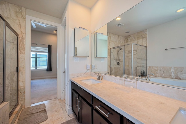 full bathroom featuring visible vents, a shower stall, a bathtub, recessed lighting, and vanity