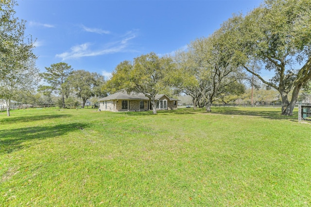 view of yard featuring fence