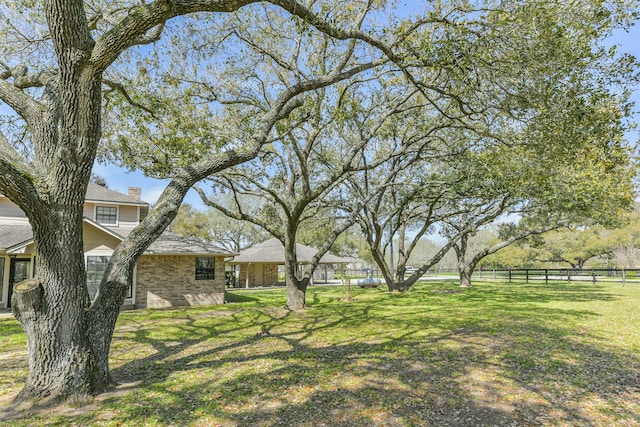 view of yard with fence