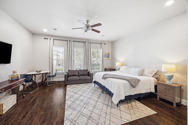 bedroom featuring visible vents, a ceiling fan, wood finished floors, recessed lighting, and baseboards