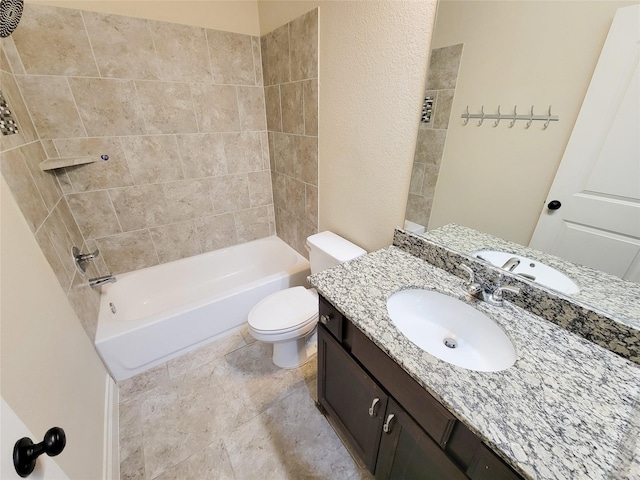 bathroom featuring shower / bath combination, toilet, and vanity