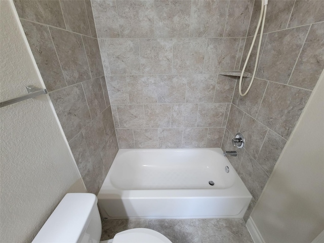 full bath with toilet and shower / bathtub combination