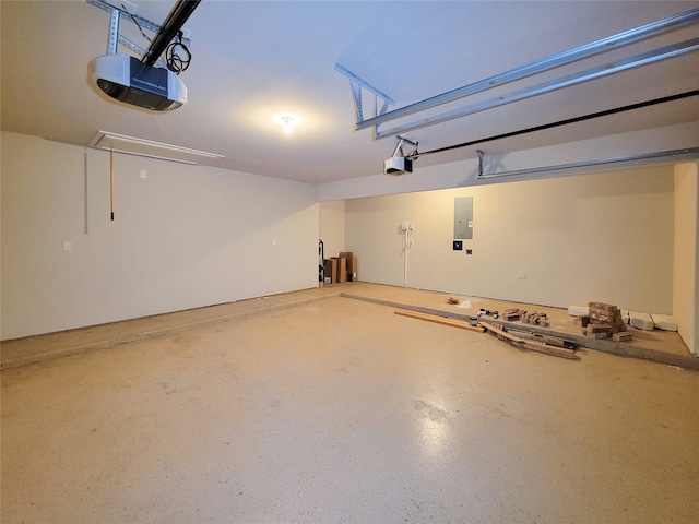 garage featuring electric panel and a garage door opener