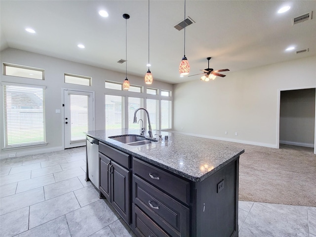 kitchen featuring visible vents, light carpet, a sink, stainless steel dishwasher, and ceiling fan